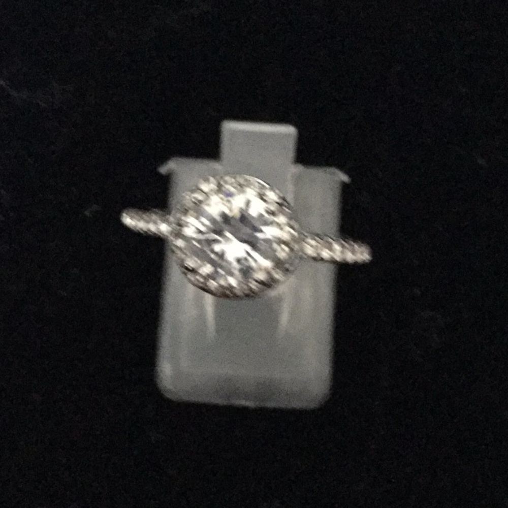 Sterling silver ring with white sapphires
